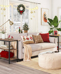 Rustic Brown And Black 3 Tier End Table With Open Storage Shelves in cozy living room setting with holiday decor.