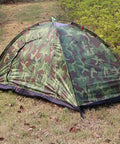 Camouflage Solo Camping Tent for Hiking Lightweight One Person Tent with Easy Setup One Entrance in nature setting.