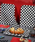 Set Of Three 13 X 10 Inch Rectangular Checkered Serving Trays Black And White Racer Platters for snacks on a tabletop.