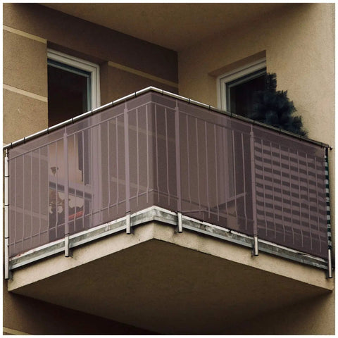 Adjustable Stair Banister Safety Net Gate for Baby Proofing and Pets installed on a balcony, dark brown mesh barrier, fits most railings.