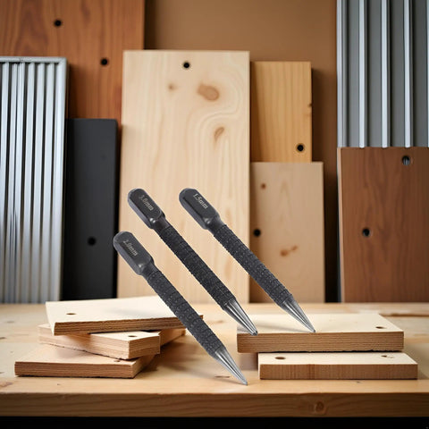 Tough As Nails 3 Piece High Carbon Steel Center Punch Set Delivers Pinpoint Marks On Metal Wood And Alloy Steel For Any Drilling Project, displayed with wooden boards.