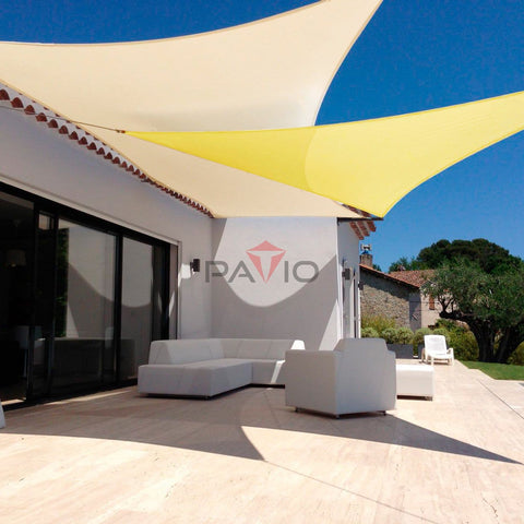 Beige 8x8 Foot Shade Sail Rectangle Canopy for patio offering sun block, set in a modern outdoor space with furniture and trees.