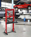Rock Solid 12 Ton Hydraulic Shop Press Heavy Duty H Frame Benchtop With Swivel Base And Black Powder Coat in garage setting.