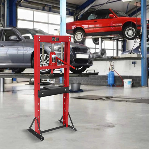 Rock Solid 12 Ton Hydraulic Shop Press Heavy Duty H Frame Benchtop With Swivel Base And Black Powder Coat in garage setting.