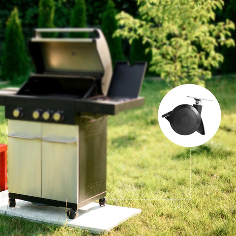 Built Tough Locking Caster Wheels For Weber Spirit 200 And 300 Series Grills with swivel plate near grill on grass.