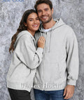 Couple wearing Unisex Travel Hoodie With Built In Eye Mask In Airplane Mode For Naps On The Fly Cozy Zip Up Fleece Jacket.