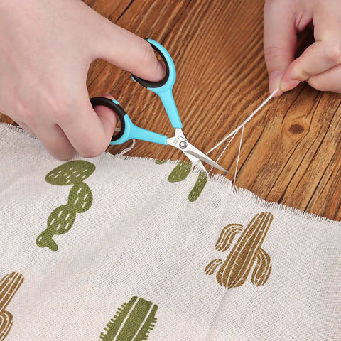 Sewing Scissors Bundle Set For Quick Cuts And Precise Sewing performing embroidery cutting on fabric with 3.9 Inch scissors.