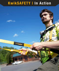 Person using Copperhead Work Positioning Lanyard 2 Pack Single Leg No Shock Absorber 100 Percent Polyester Webbing outdoors for safety.