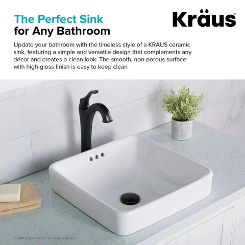 Elavo Square Vessel Sink With Overflow White Porcelain Ceramic Semi Recessed Bathroom Vanity Sink 16 And A Half Inch Scratch Resistant Easy To Clean High Gloss Glaze installed on a bathroom countertop with a black faucet and plant nearby
