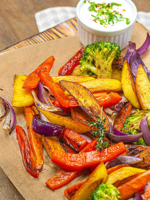 Roasted vegetables on Precut Parchment Paper Sheets 200 Pack Unbleached Nonstick Baking Sheets 16x24 Inches For No Fuss Baking