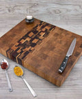 Top view of wooden cutting board with knife, spices, and non slip rubber feet with stainless washer and screws 1 inch black round rubber feet 20 pack for cutting boards.