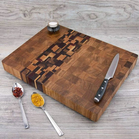 Top view of wooden cutting board with knife, spices, and non slip rubber feet with stainless washer and screws 1 inch black round rubber feet 20 pack for cutting boards.