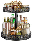 Two-tier black metal lazy Susan spice rack with ornate floral edge, 12-inch diameter, holding jars and bottles