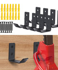 Eight Pack Jack Stand Wall Mount Organizer for Hanging Heavy Duty Garage Hooks holding a red jack stand, screws and plugs included.