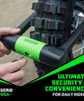 Person securing bike wheel with heavy duty bike lock set including U lock, part of set with 4ft steel cable, padlock, four lighted keys.