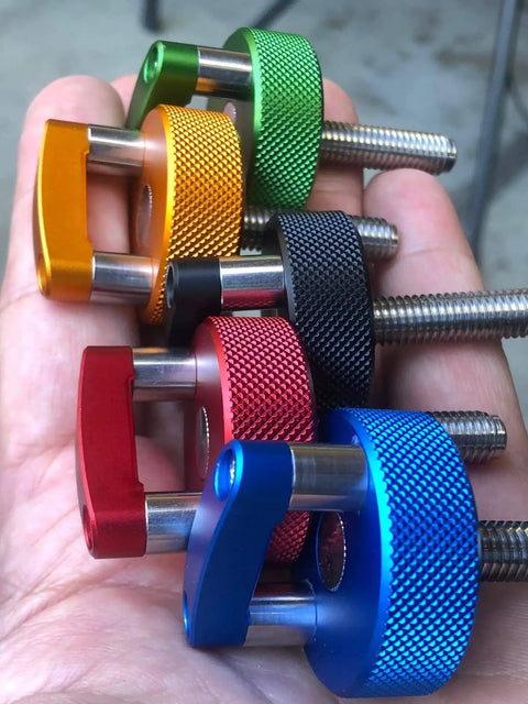 Hand holding Billet Aluminum Orange Hard Top Fastener For Ford Bronco, Quick Removal Thumb Screw with D Ring, multiple colors, M8 1.25 thread