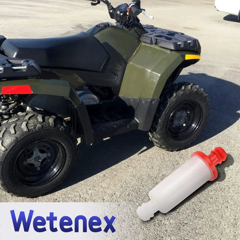 Inline Fuel Filter Replacement For Polaris Sportsman 300 335 400 450 500 550 600 700 850 Trail Boss Magnum ATV next to vehicle