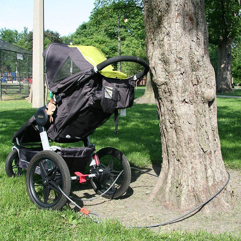 Heavy Duty Security Cable Lock With Loops 10mm Braided Steel securing a stroller to a tree in a park setting