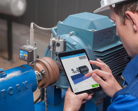 Engineer using tablet with TKSA 51 Wireless Laser Shaft Alignment System Pro Grade Precision With Flexible Three Position Measurement
