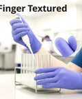 Premium Violet Nitrile Exam Gloves 3 Mil Medium 100 Pack Box Latex Free Powder Free Food Safe worn while pipetting in a lab.