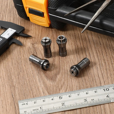 4 Piece 1/4 To 1/8 Inch Die Grinder Collet Adapter Set on wooden surface with tools, silver iron finish