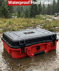 Road Trip Ready Waterproof Hard Case For Starlink Mini Kit Red Black in muddy outdoor setting