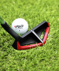 35 Inch Right Handed Golf Chipper With 32 Degree Loft on green grass beside golf ball