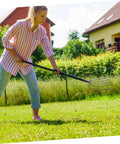 Woman using Manure And Grass Fork Handheld Tool For Outdoor Yard Cleanup Multi Functional Iron Fork With Five Point Solid Tines