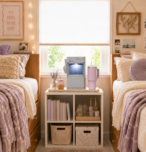 Legit Nugget Ice Maker, Portable Countertop Pellet Ice Machine in stone grey on a nightstand between two beds, perfect for dorms.