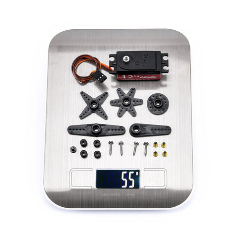 Readytosky 12kg waterproof servo motor kit with metal gears and arm linkages on a digital scale