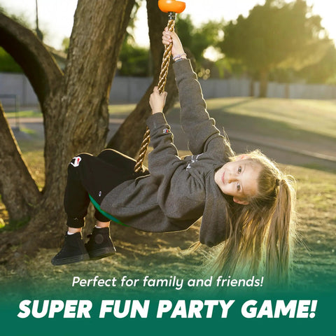 Child playing on Kid Friendly Tree Swing With Disc Seat And Climbing Rope Carabiner And 4 Ft Strap Easy Install Backyard Playground Accessory.