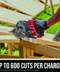 Heavy Duty Seven Quarter Inch Cordless Circular Saw Featuring Rear Handle And Brushless Motor cutting through lumber on a worksite.