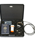 Heavy Duty Lockable Steel Case With Security Cable And Keyed Lock, open with passport, watch, cards, meds, earbuds visible inside.