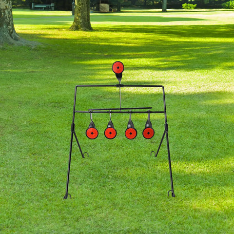 Auto Resetting BB Gun Targets For.177 And.20 Caliber on grassy backyard, sturdy black steel frame with red target stickers
