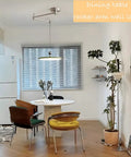 Dining room with French Cream Dome Swing Arm Hanging Lamp With Acrylic Shade Pendant Light Iron Body Dope Three Color Temperature Modes For Bedroom Living Room Study Office Hotel Lobby Foyer Green above table.