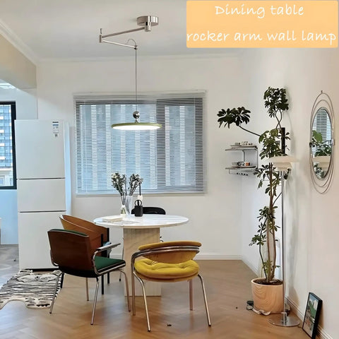 Dining room with French Cream Dome Swing Arm Hanging Lamp With Acrylic Shade Pendant Light Iron Body Dope Three Color Temperature Modes For Bedroom Living Room Study Office Hotel Lobby Foyer Green above table.