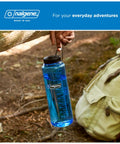 48 Oz Wide Mouth Silo Water Bottle BPA Free Durable Leak Proof Large Capacity for Hiking next to backpack outdoors