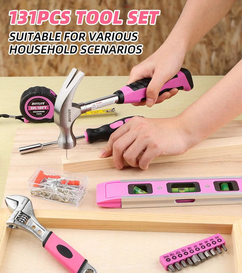 Person using hammer from Stylish 131-Piece Pink Tool Kit for Women with Essential Hand Tools Like Hammer, Adjustable Wrench, Pliers.
