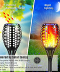 Upgraded Solar Torch Lights With 96 LEDs Realistic Flickering Flame Effect Waterproof Outdoor Pathway Lights solar charging and glowing.