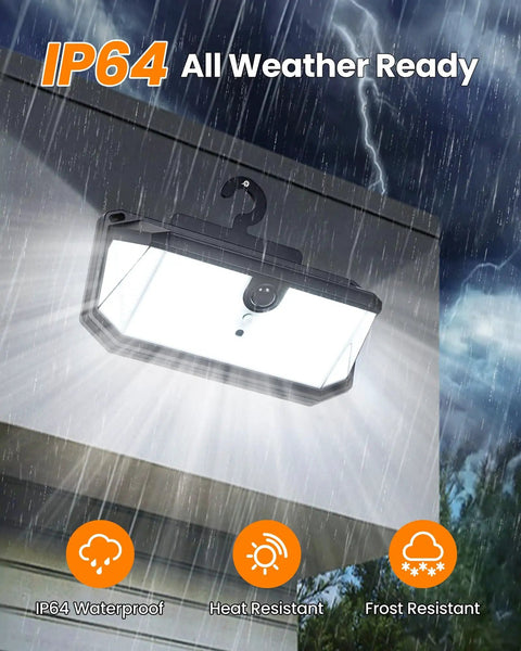 Solar Fence Lights With 526 LEDs, Motion Sensor, 270 Degree Wide Angle, 3 Modes, Remote Control, Hook Mount; in rain demonstrating IP64 waterproofing.