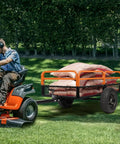 Beast Utility Dump Cart With 1600 Lb Capacity And 15 Cu Ft Steel Trailer Removable Sides All Terrain Wheels Compatible With ATV UTV And Lawn Tractors For Garden Yard Hauling loaded with mulch