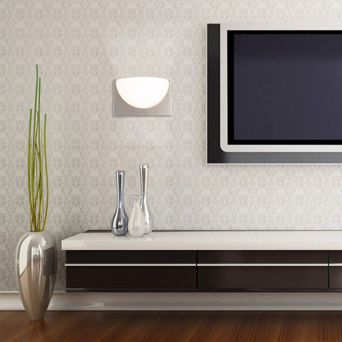 DweLED Mylie 10-In LED Wall Sconce 3000K in Aged Brass With Front Light And Downlight installed in modern living room