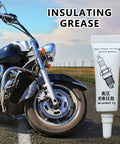 5g tube of high-temp dielectric lubricant for electronics and automotive weatherproof silicone grease next to motorcycle tire