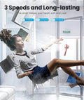 Woman gracefully floating with books in air and Mini Portable Handheld Fan With Base 3 Speed USB Rechargeable Dual Use Desk
