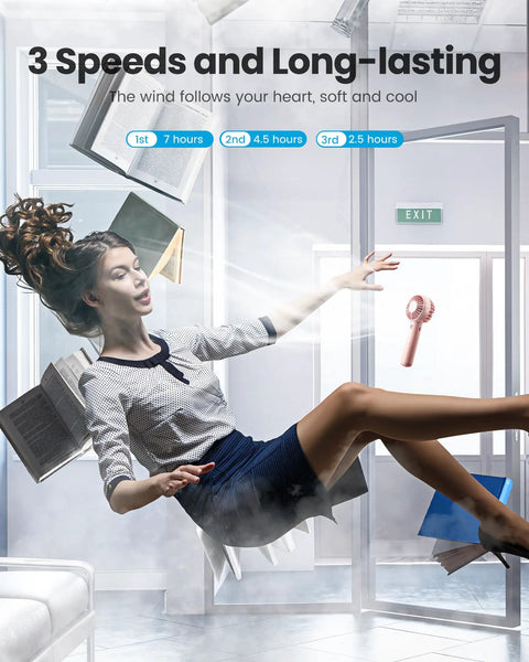 Woman gracefully floating with books in air and Mini Portable Handheld Fan With Base 3 Speed USB Rechargeable Dual Use Desk