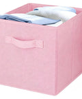 Super Durable Collapsible Storage Cubes 10.5 Inch Foldable Fabric Bins with pink handle holding towels in a clean closet.