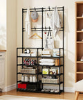Five Tier Coat And Shoe Rack With Eight Hooks Double Row Organizer For Entryway And Living Spaces Keeps Shoes Hats Bags Neatly Organized In Black For Entryways Closets And Mudrooms Space Saver All In One showing shoes and clothes on rack in a room.