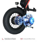 Close-up of A8 Electric Handcycle Wheelchair Power Attachment Upgrade Kit motor and wheel, black and red, rugged terrain features