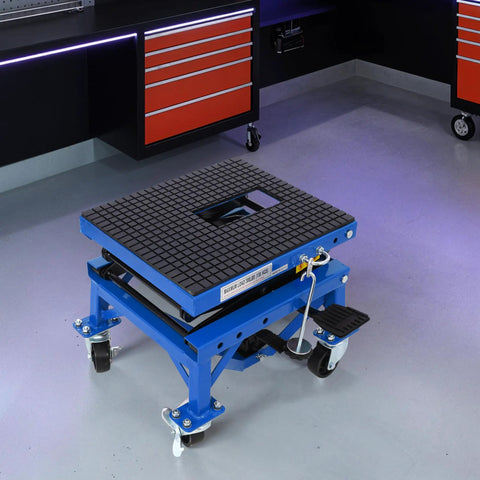 Beefy Hydraulic Motorcycle Scissor Jack Lift With Foot Step Lever And Four Wheels, Height Adjustable, Blue in a garage