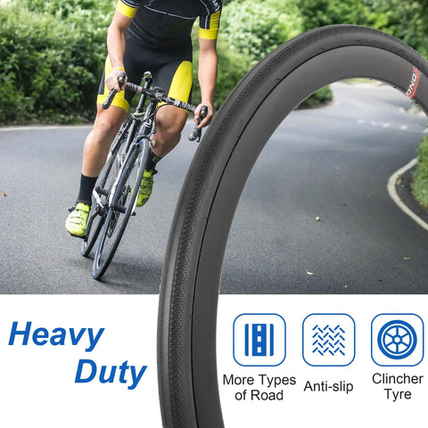 Cyclist using 2 Pack 700x32c Road Bike Tires And Tubes 32-622 700C Foldable Tires with Presta Valve on a winding road